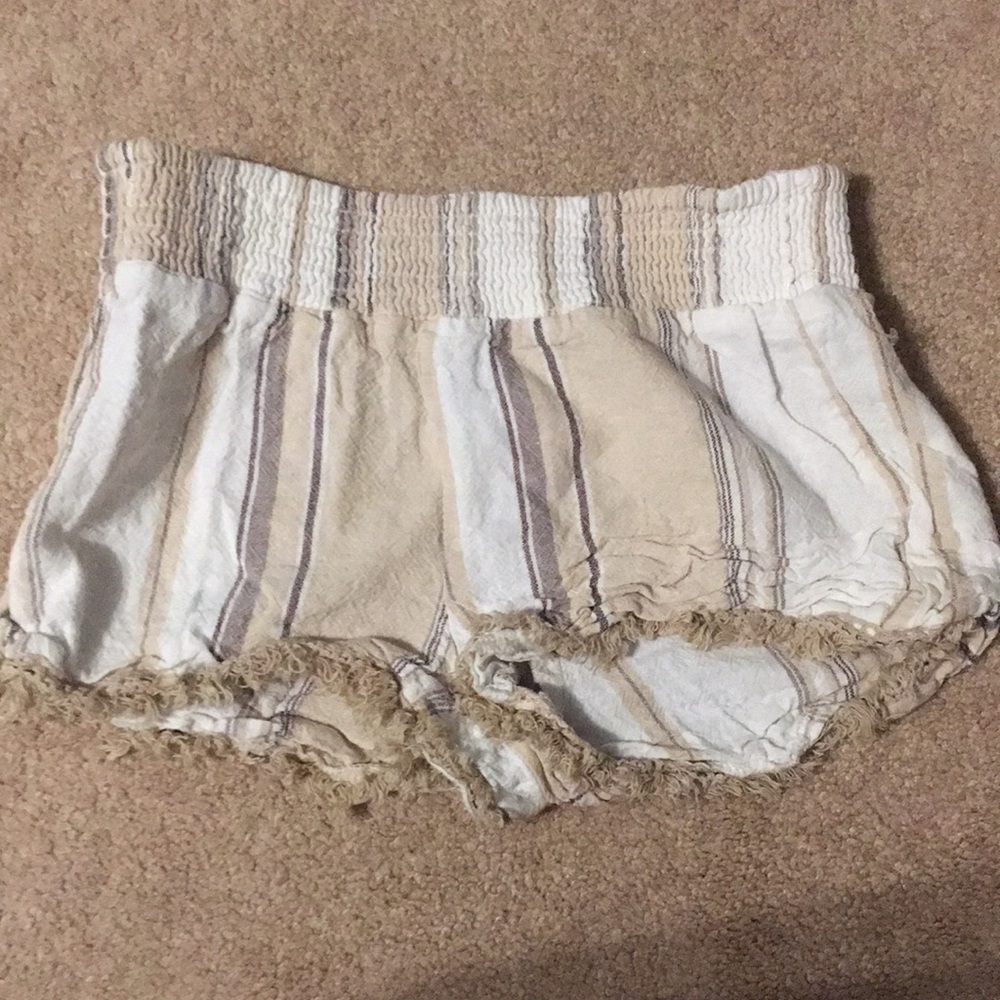 White and tan lose shorts